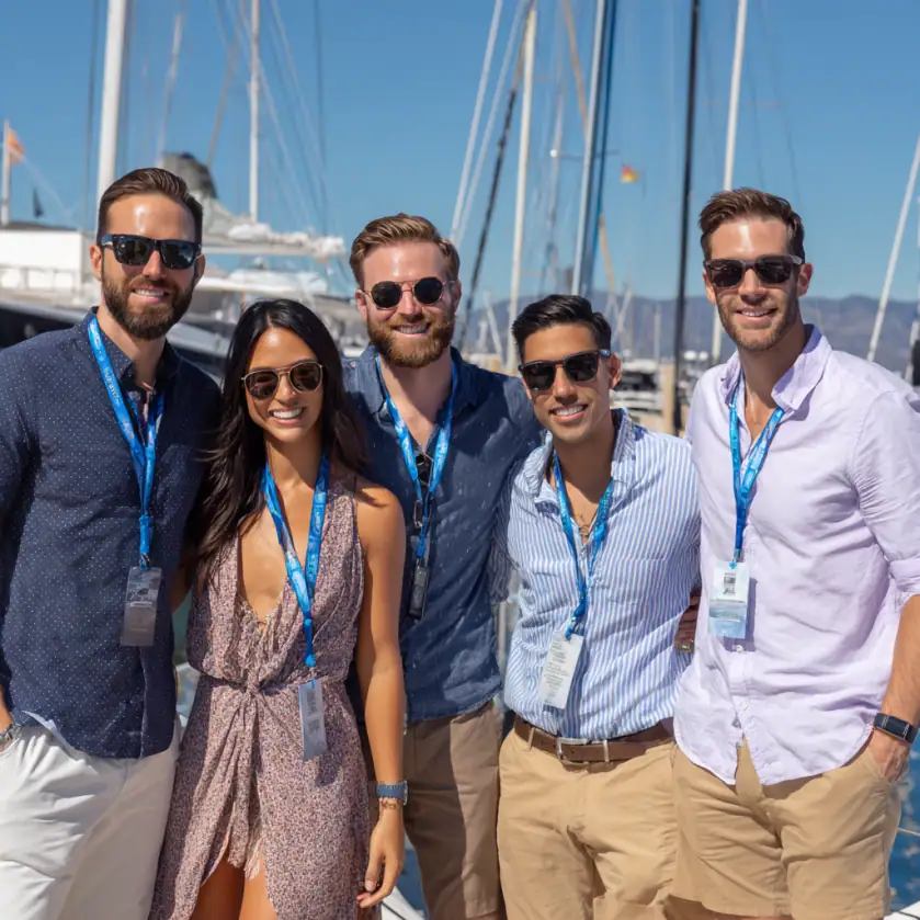 co-workers about to board a yacht for a corporate retreat corporate event cruises